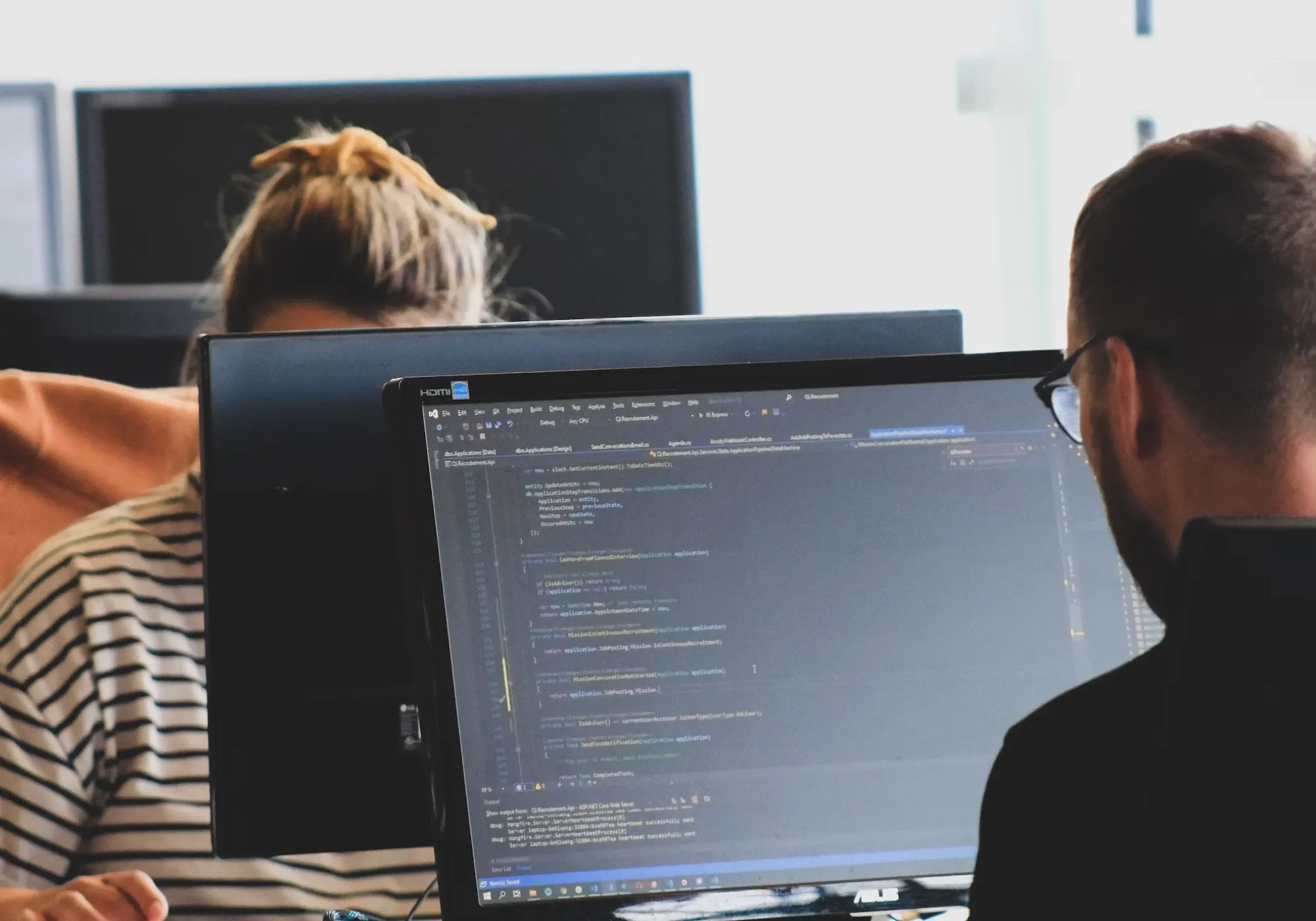 Man at a computer screen working