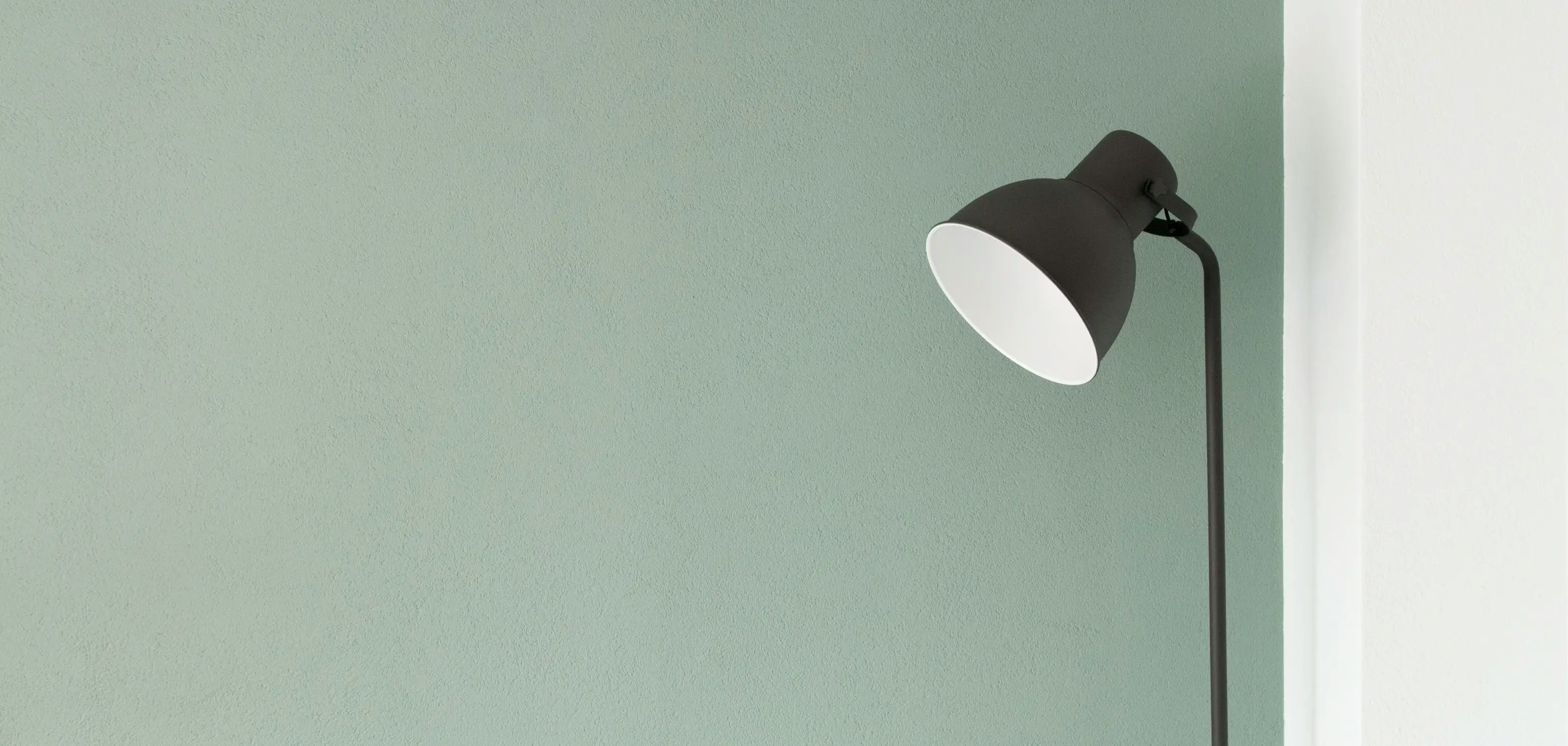 Lamp with green wall background