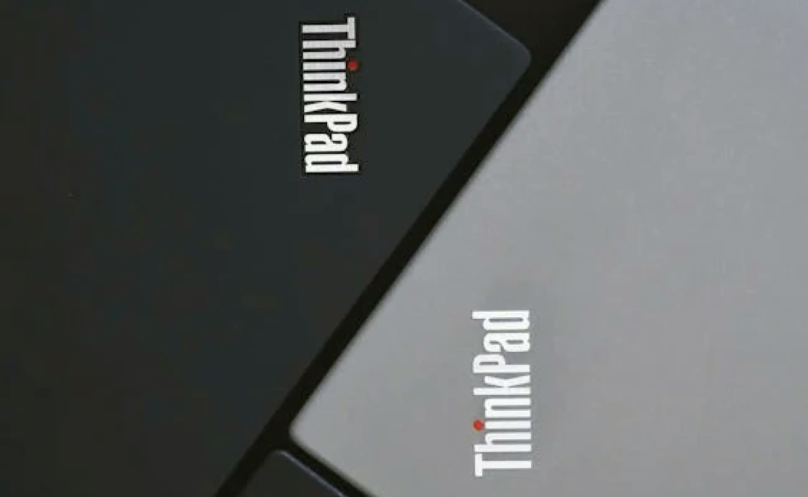 Lenovo Thinkpad laptops next to each other