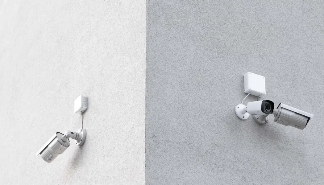 CCTV cameras on concrete wall