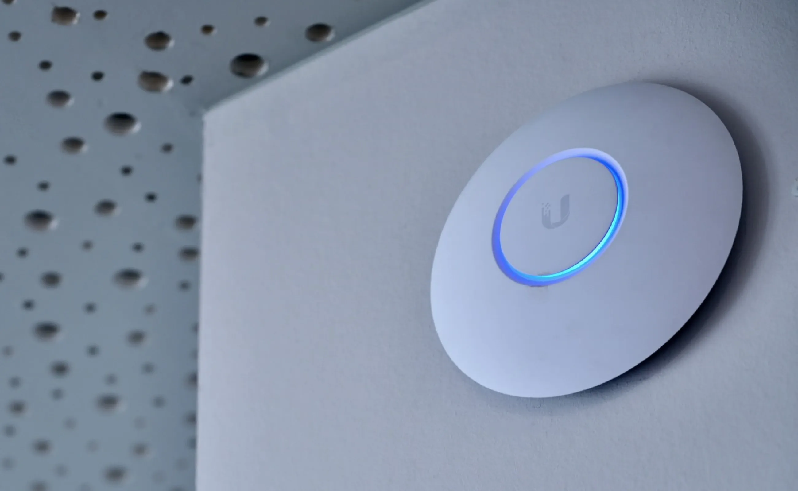 Ubiquiti access point on wall